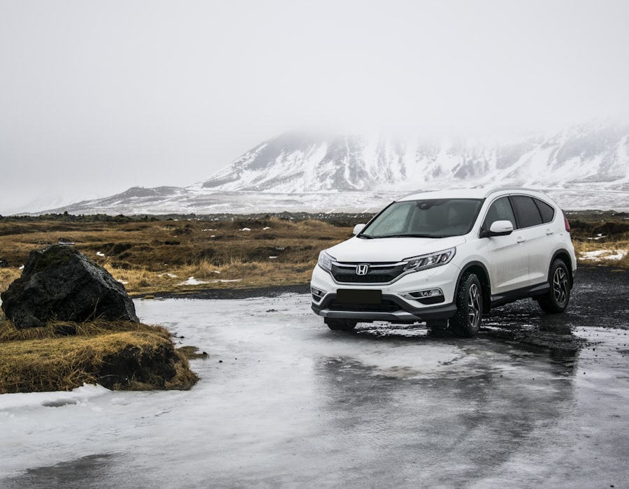 A family SUV parked in front of open scenery